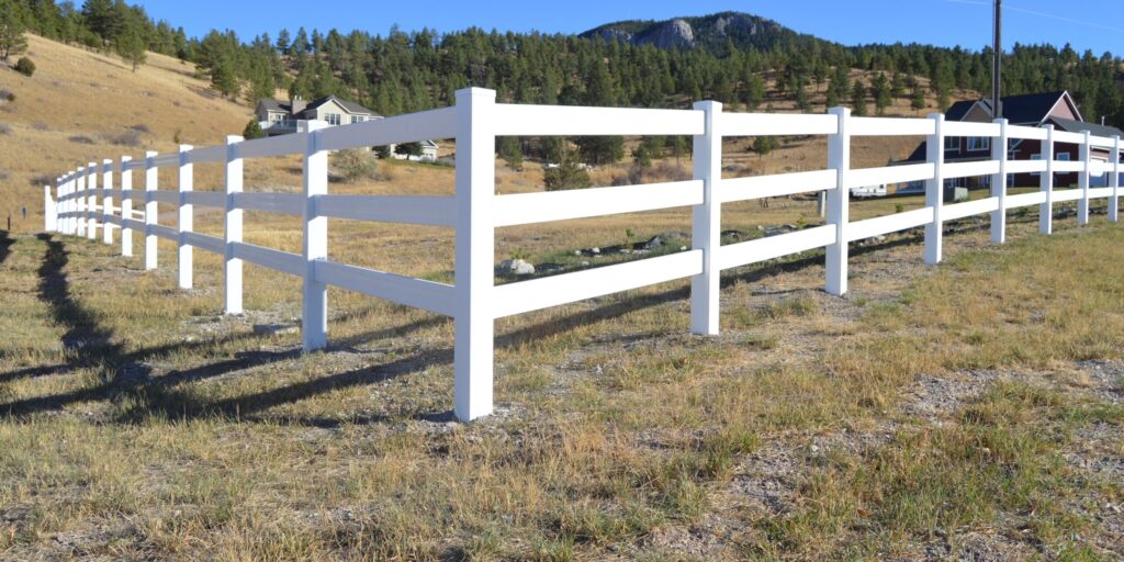 Three rail ranch fence in white vinyl in Helena, Montana